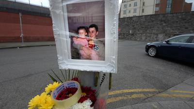 Flowers  and photograph mark  spot where   ‘great friend to have’  shot dead