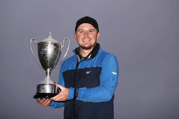 Eddie Pepperell defies the wind and rain to take British Masters