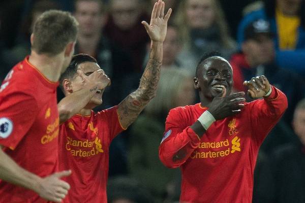 Liverpool bounce back to brush aside timid Arsenal