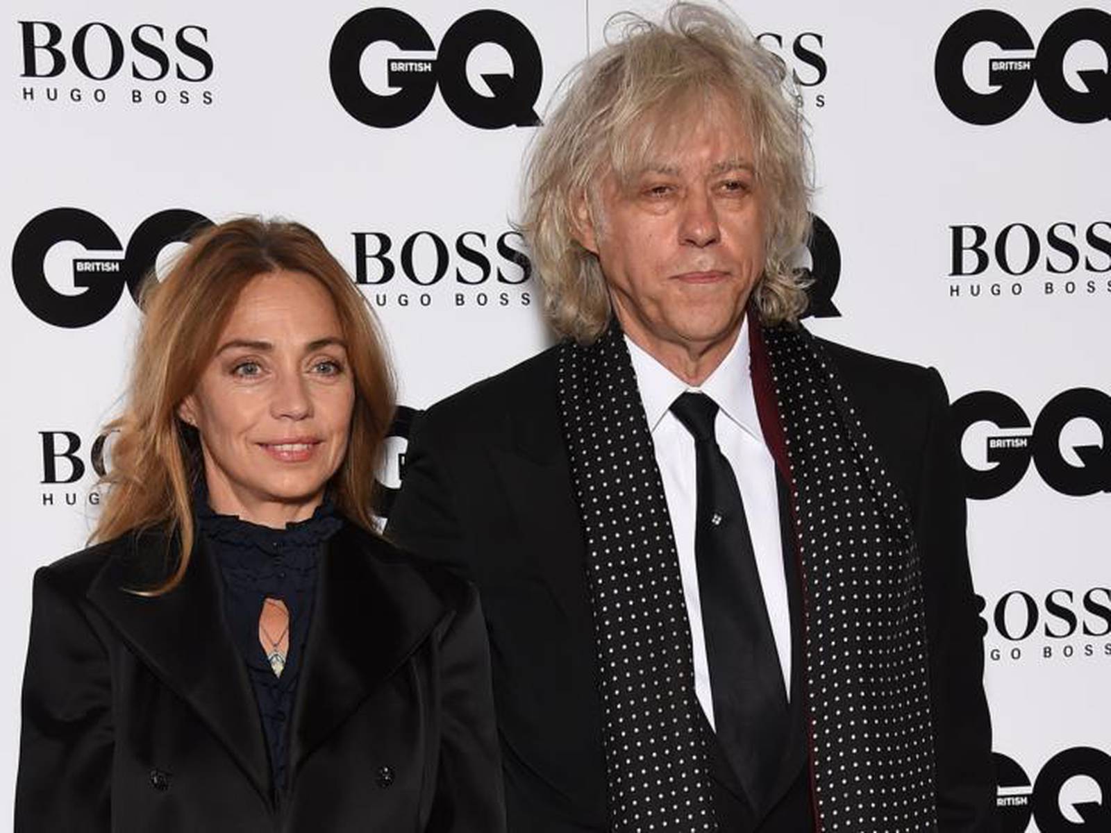 Irish composer Bob Geldof and his wife upon arrival to the cocktail  reception for the inauguration of the new Louis Vuitton house on the  Champs-Elysees in Paris, France, on October 9, 2005