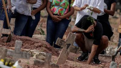 Bolsonaro refuses to address record daily total of Covid deaths in Brazil