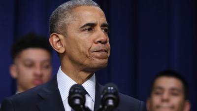 Barack Obama defends response to Russian hacking