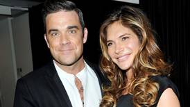 Robbie Williams lets his wife entertain him during labour