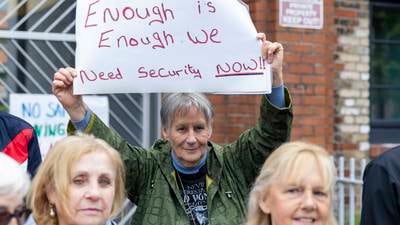 ‘It is becoming a living hell’: residents of Dublin housing complex protest against anti-social behaviour