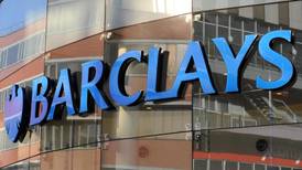Barclays hit by slump in trading revenue