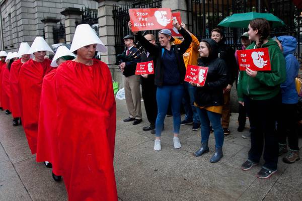 Scarlet robes and Opposition on red alert as Dáil returns