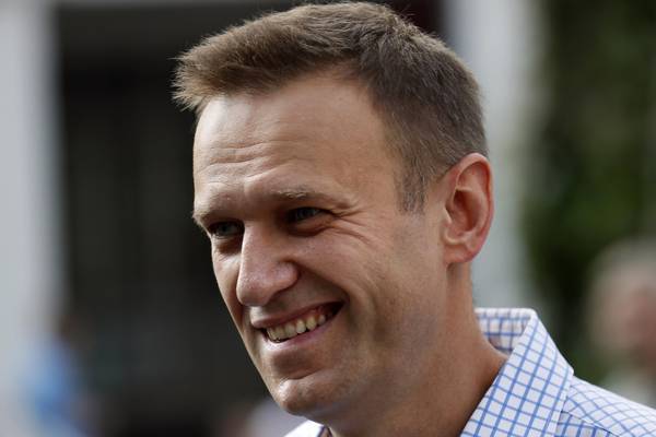Russian police raid premises of hundreds of Alexei Navalny associates