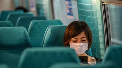 WHO envoy calls for mandatory face masks on public transport