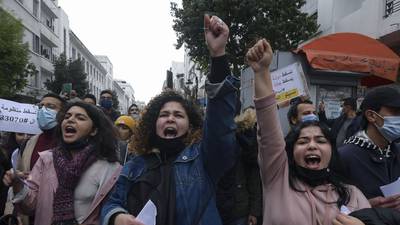 Protests erupt in Tunisia as government struggles to contain virus