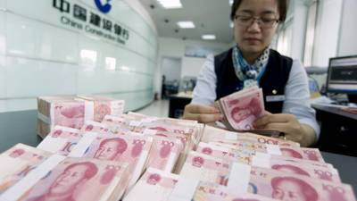 Chinese central bank devalues yuan by nearly 2%