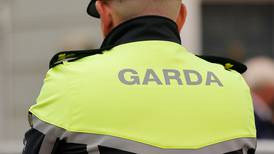 Two men arrested and garda receives minor injury following armed robbery in Dublin