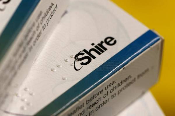 Bid target Shire grows earnings 6% but holds cautious outlook