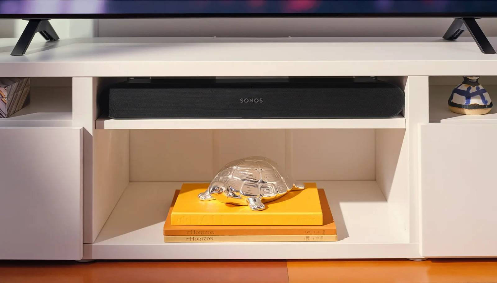 The Sonos Ray 3 speaker beneath a TV