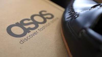 Asos says investment to hold back profit in 2014-15