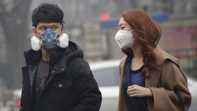 Beijing issues first pollution red alert as smog engulfs capital