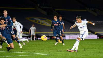 Arsenal hang on with 10-men for a goalless draw at Leeds
