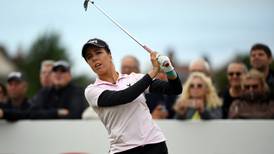 Georgia Hall points to Ken on the course at Women’s British Open