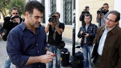 Greek journalist back on trial for publishing Swiss bank list