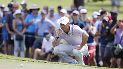 Tour Championship: Rory McIlroy hangs tough to turn things around