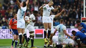 England hold off France to secure first Grand Slam since 2003