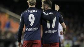 More woe for Nevilles as Atletico too good for Valencia