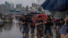 Hong Kong protesters defy police ban in show of strength