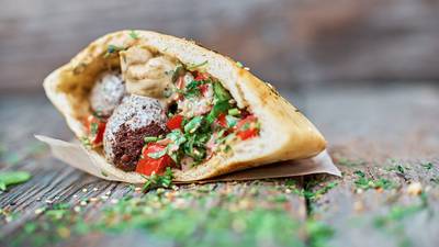 Proper streetside falafel, dripping with hot sauce, that you can re-create at home