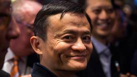 Alibaba surges on massive demand in trading debut