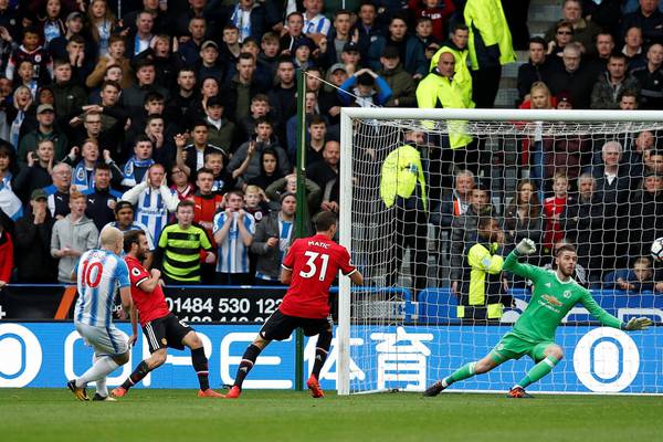 Huddersfield roar to famous win over lacklustre Man United