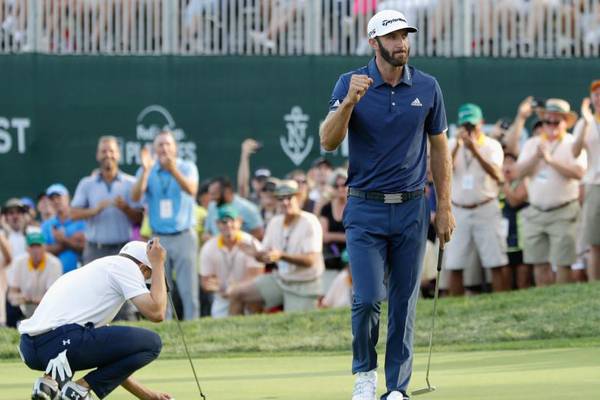 Johnson emerges on top in heavyweight battle with Spieth