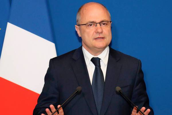 French interior minister resigns over payments to daughters
