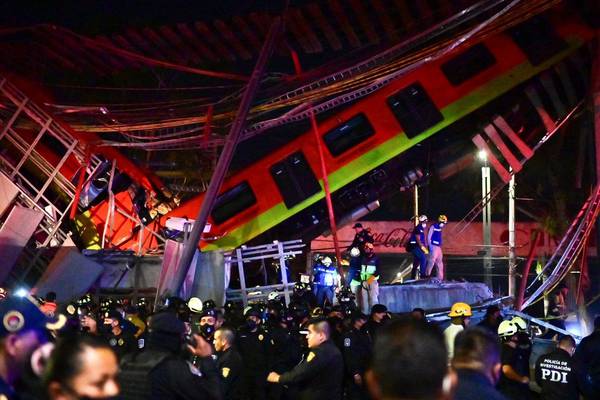 Mexico promises answers after train overpass collapse kills 23