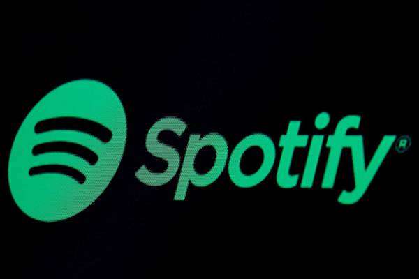 Spotify hits subscriber targets in race with Apple Music