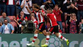 United held by 10-man Southampton