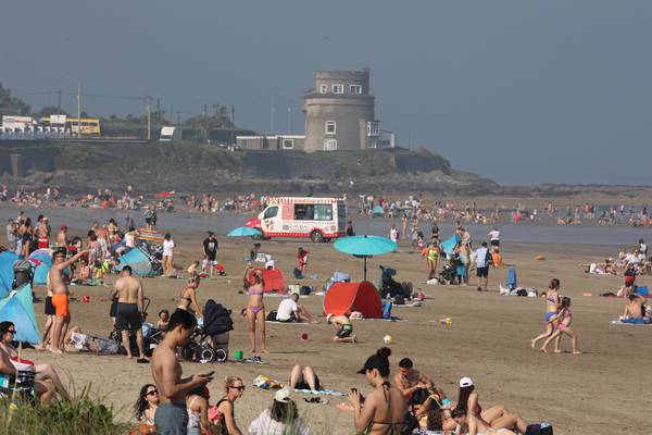In pictures: Crowds take to the beaches amid record high September temperatures