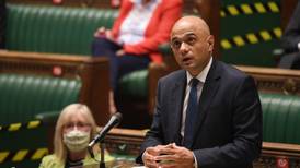 Sajid Javid apologises for comment about ‘cowering from’ virus