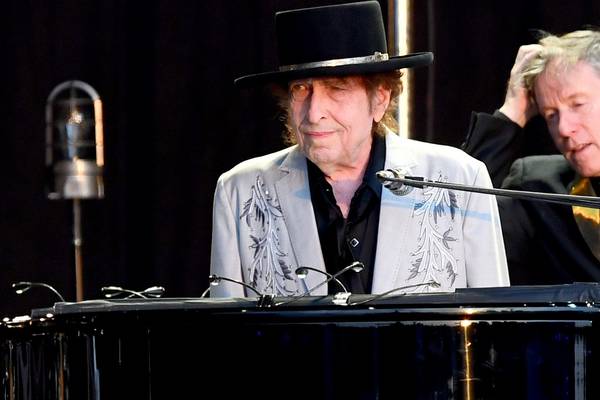 Bob Dylan and Neil Young in London: mangled back catalogue and a stream of hits