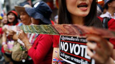 Gunshots, explosions rock Thai protest a day ahead of polls