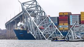 Baltimore bridge collapse: Two bodies recovered from water as search for remaining missing workers continues