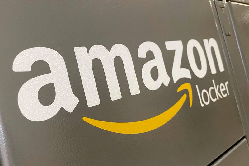 Amazon says profit may continue to slump