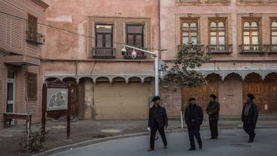 China steps up pressure on Uighurs with re-education camps
