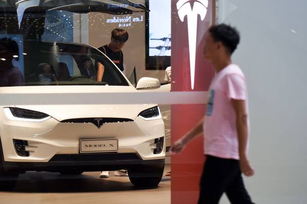 Tesla to investigate car that appeared to burst into flames in Shanghai