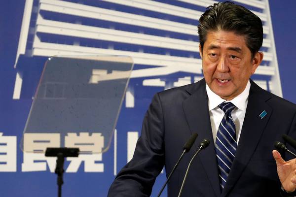 Japan shares at two-decade top as Abe wins