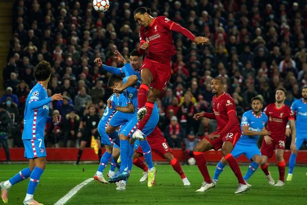 Liverpool brush aside 10-man Atlético Madrid with ease to progress in style