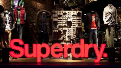 Superdry founder cuts discounts following profit warning